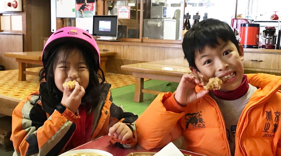 Enjoying a hot meal after skiing in Nozawa