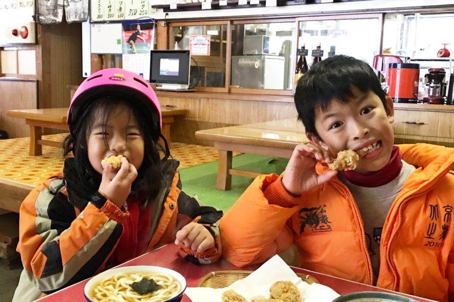 Enjoying a hot meal after skiing in Nozawa